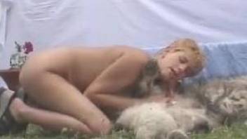 Busty woman enjoys the dog to fuck her good