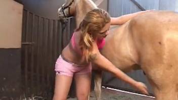 Voluptuous whore experiences massive horse cock pounding her cunt intensely