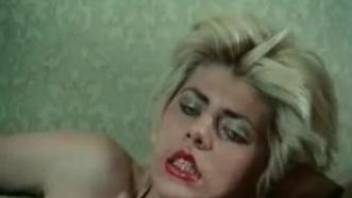 Wild bestiality video with a blond-haired retro hottie