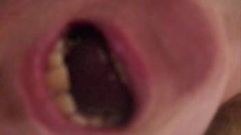 Adult animal enthusiast boastfully displaying her semen-packed mouth