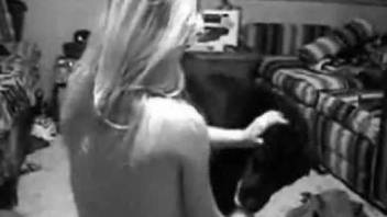 B&W security cam video showing hardcore bestiality