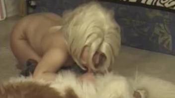 Blond-haired babe sucking a dog's wonderful cock