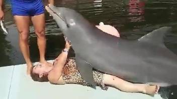 Granny gets dry-humped by a very kinky dolphin