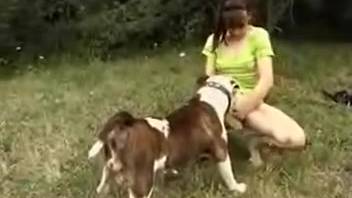 Dark-haired woman screws an empty bottle prior to intercourse with a dog