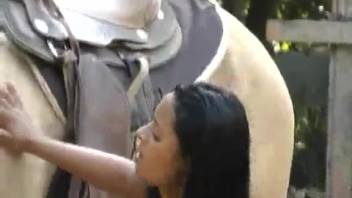 Latina woman enjoying time with her latest beloved stallion
