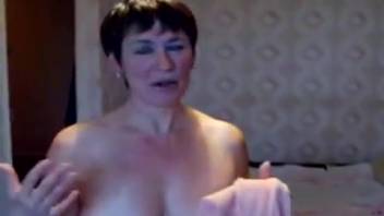 Brunette mature vixen has her slit tongued by a young dog