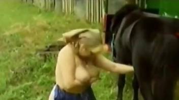 Hot bitch worships a pony penis in an outdoor vid