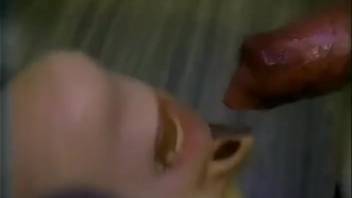 Blond slut engulfs entire canine cock in her cunt for intense XXX action