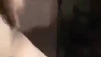 Brazen hottie captured in close-up shots blowing a canine's cock